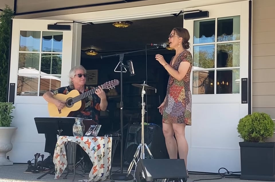 Vanessa and Jason Wolverton performing outdoors